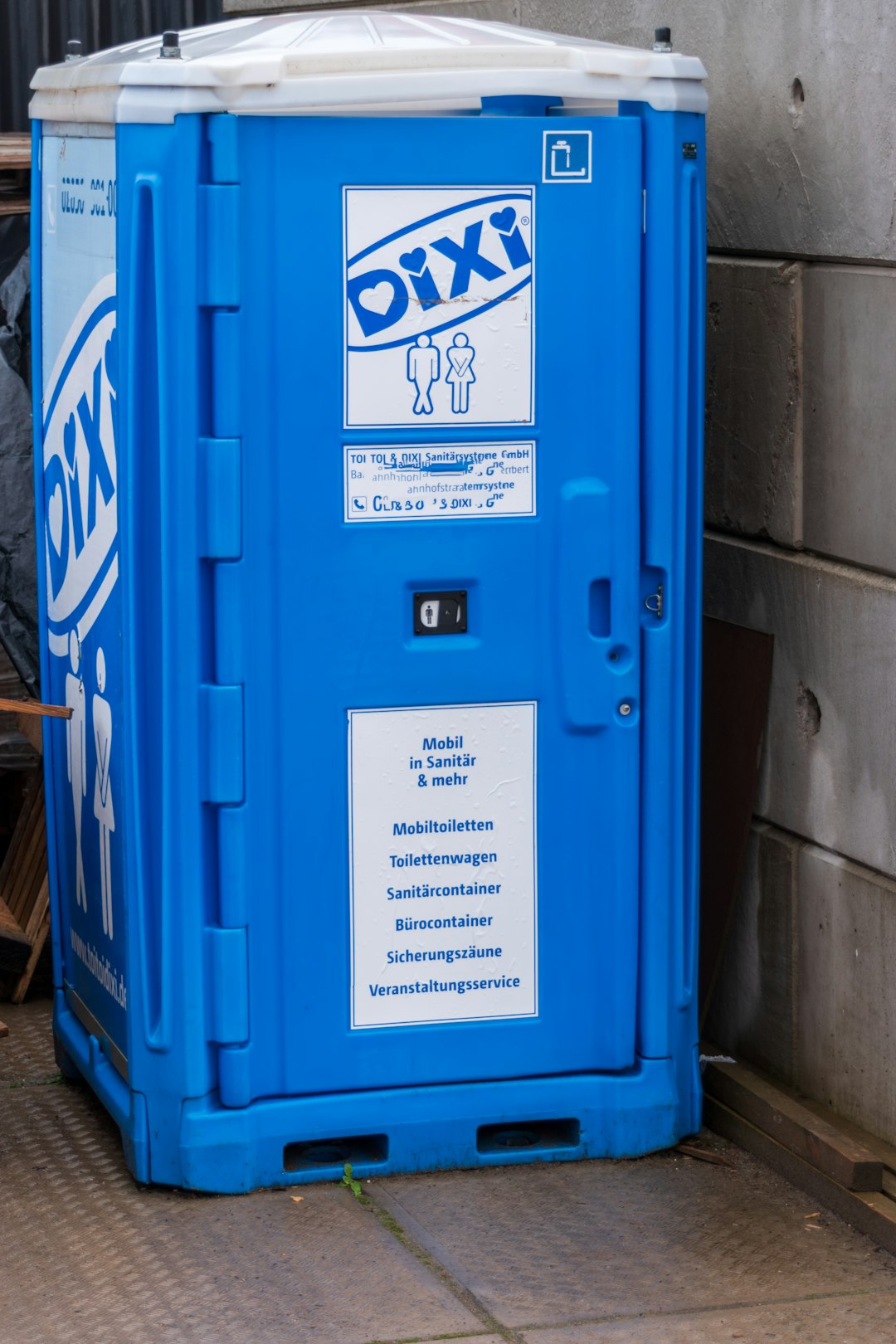 services-03 a-blue-portable-toilet-with-dixi-logo-e4-bs9aufaq